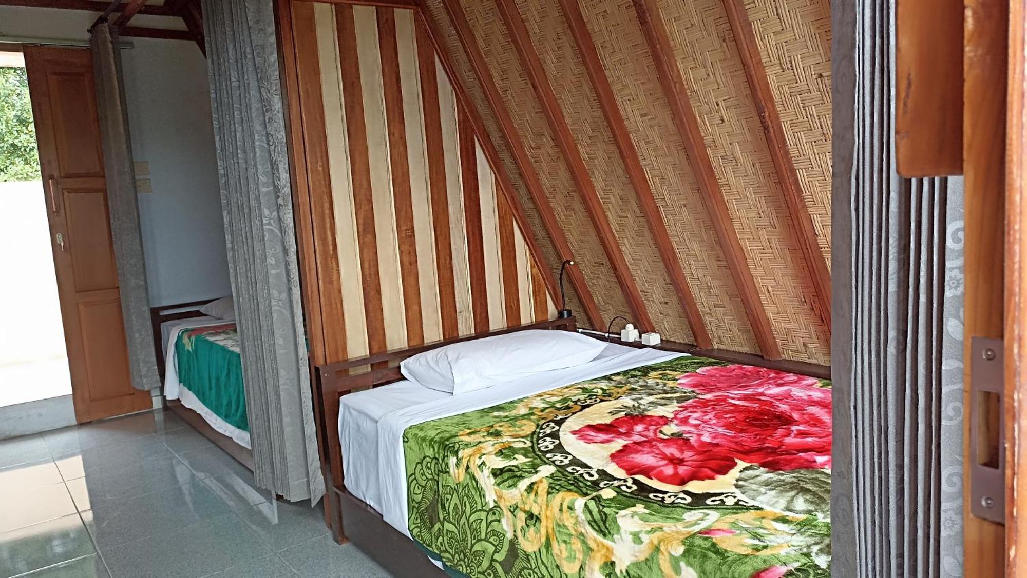 Puri Pilihani Hostel มุนดุก ห้อง รูปภาพ