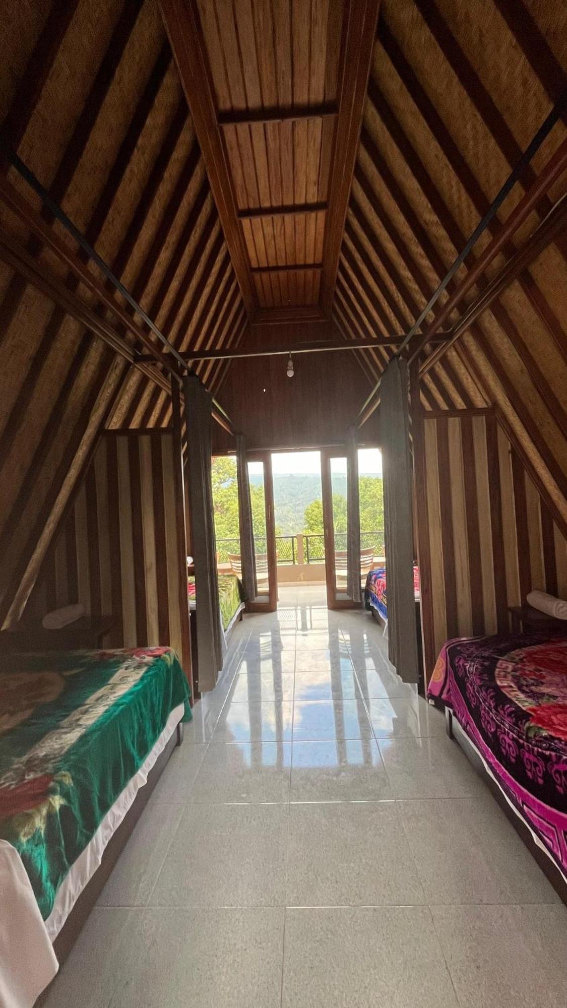 Puri Pilihani Hostel มุนดุก ภายนอก รูปภาพ